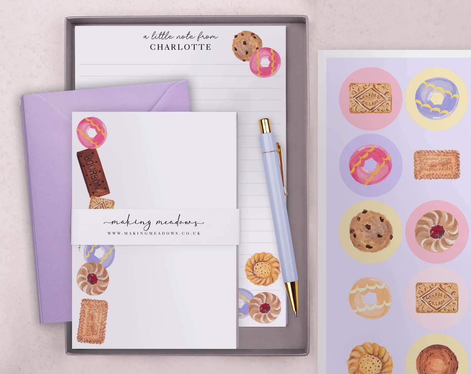 Personalised Children's Stationery Set with biscuit design, featuring note paper, envelopes, stickers, and a pen.
