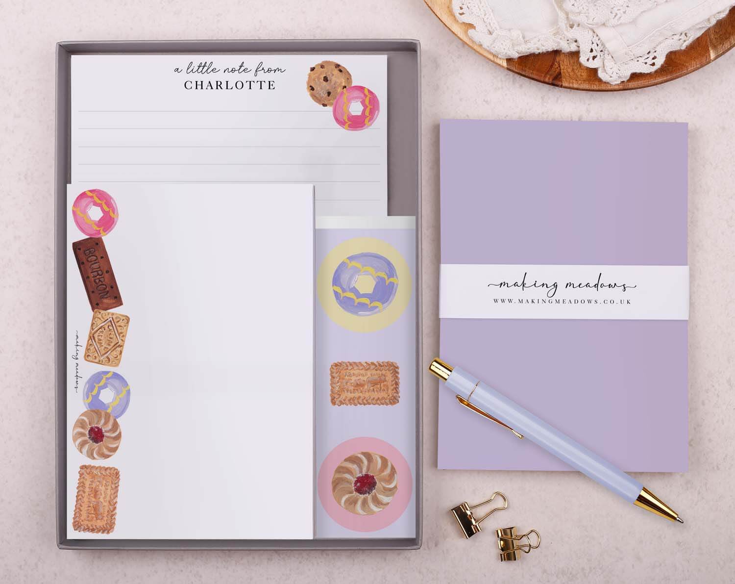 Personalised Children's Stationery Set featuring a Biscuit design with writing paper, envelopes, and a luxury pen.