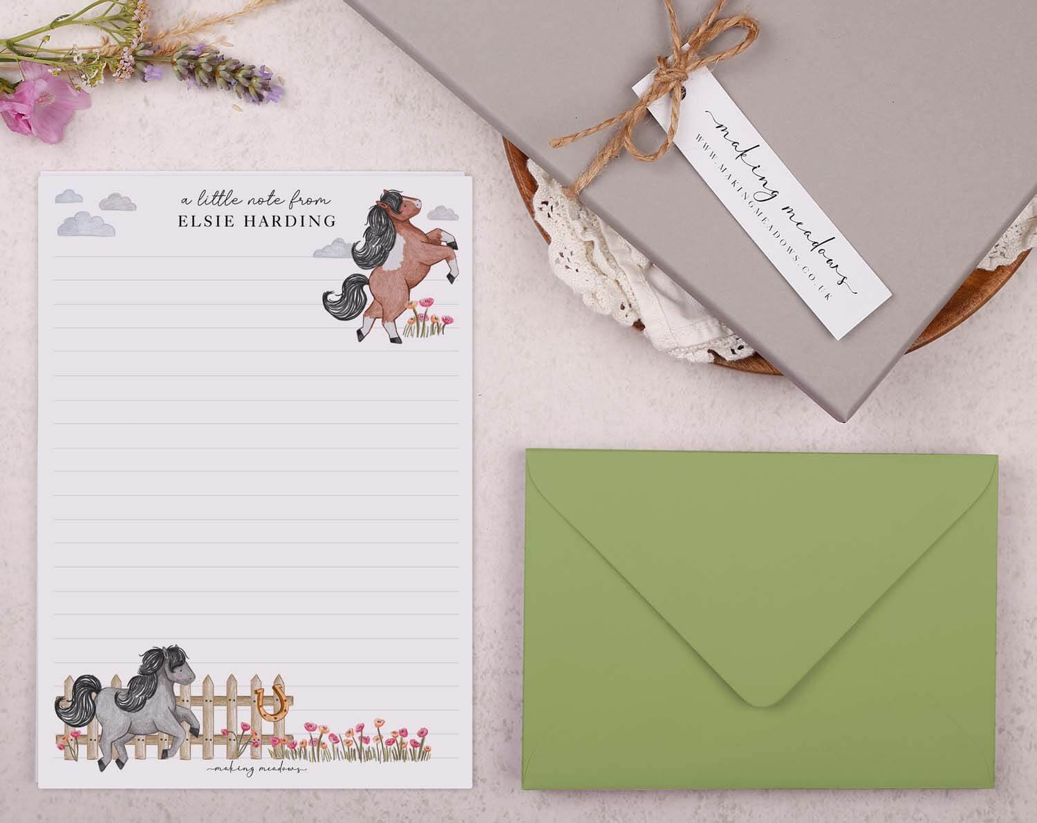 Personalised Children's Stationery Set featuring a horse design with writing paper and a green envelope.