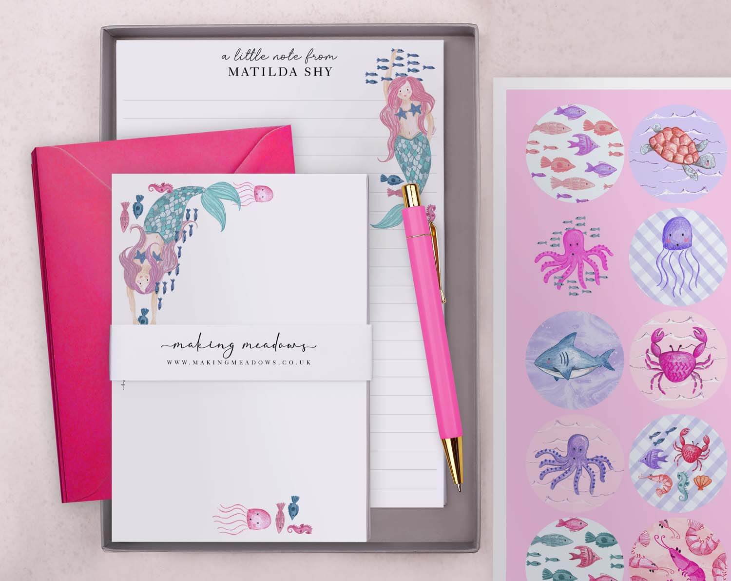 Personalised Children's Stationery Set featuring mermaid design, luxury pen, writing paper, envelopes, and stickers.