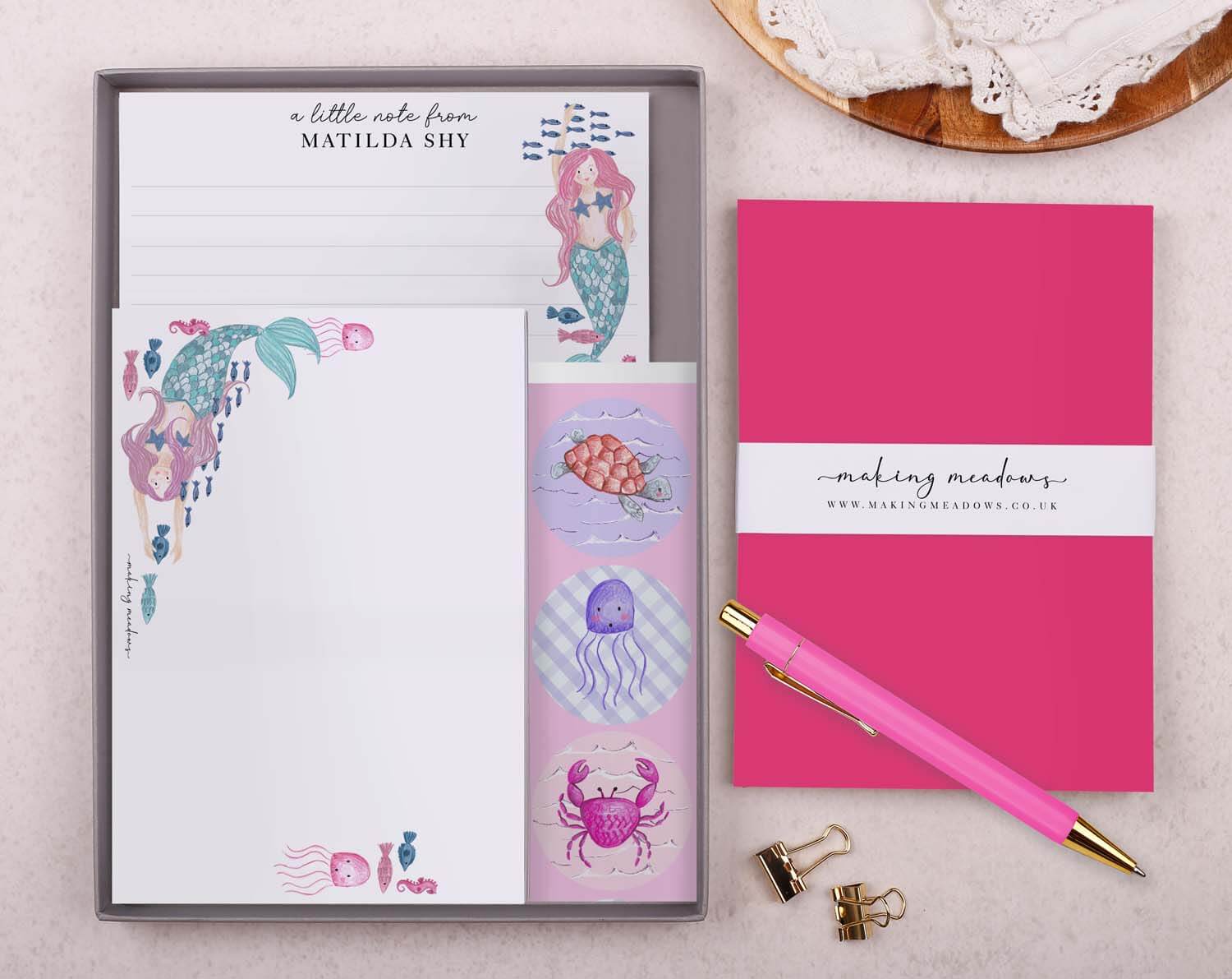 Personalised Children's Stationery Set with mermaid design including writing paper, envelopes, stickers, and luxury pen.