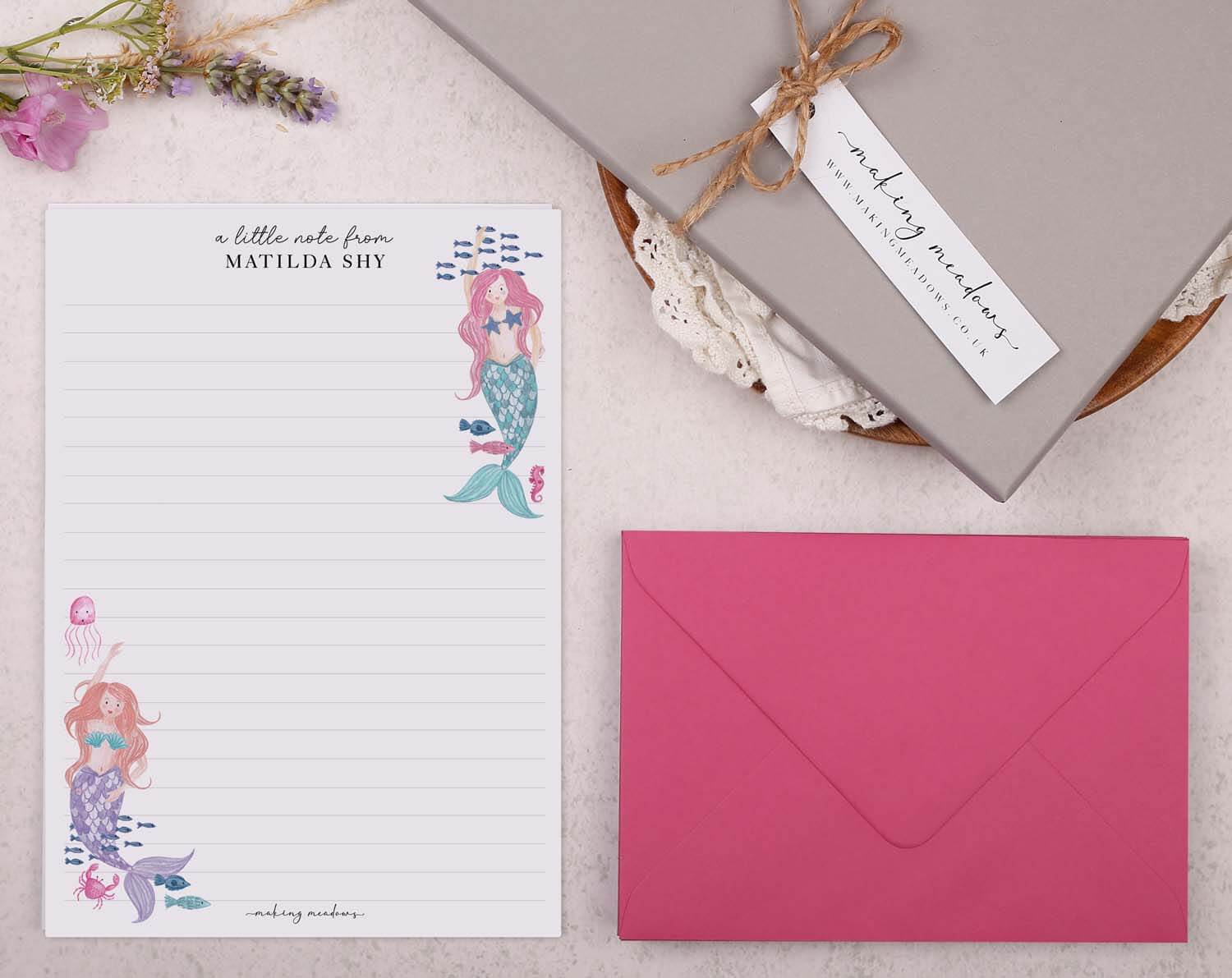 Personalised Children's Stationery Set featuring mermaid design writing paper and pink envelope.