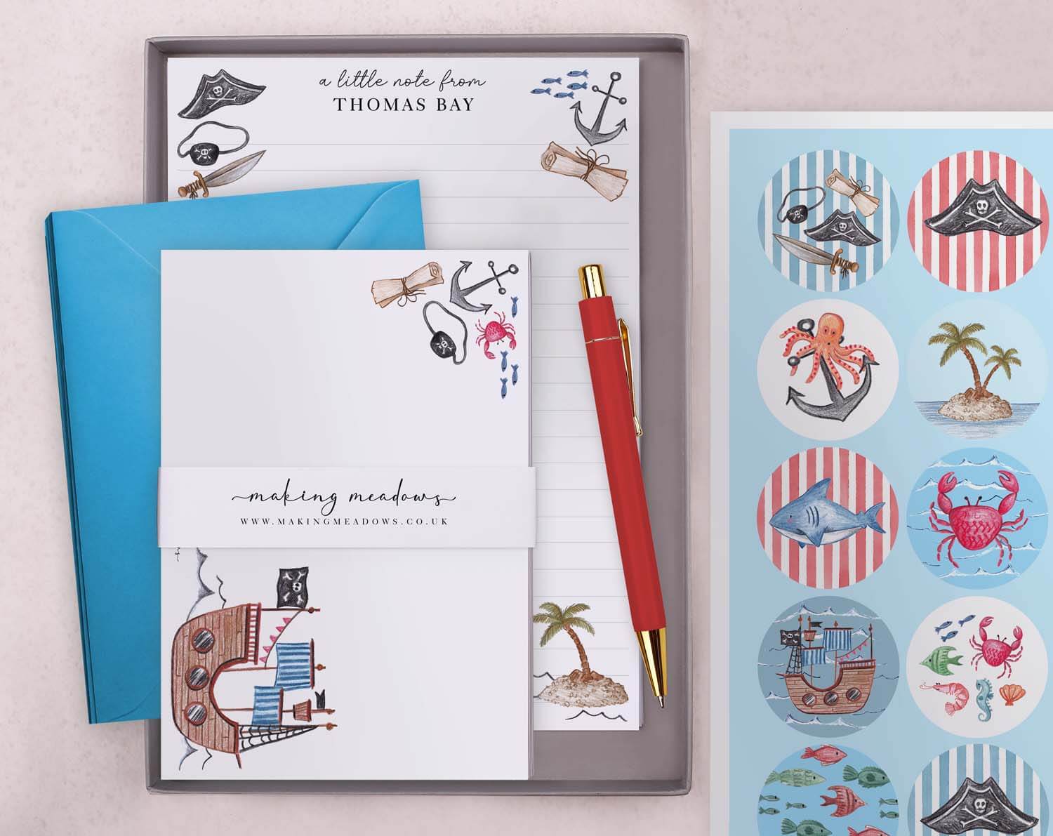Personalised Children's Stationery Set with pirate design including writing paper, envelopes, stickers, and a pen.