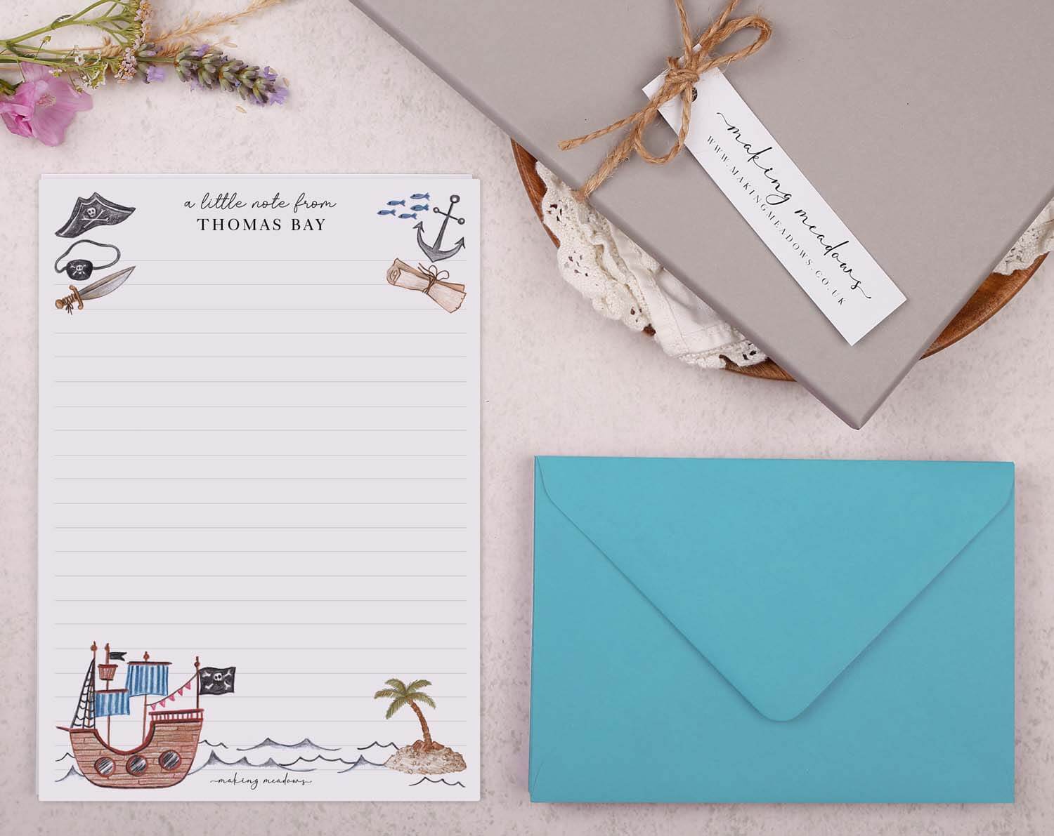 Personalised Children's Stationery Set featuring pirate design, includes writing paper and decorated envelope.