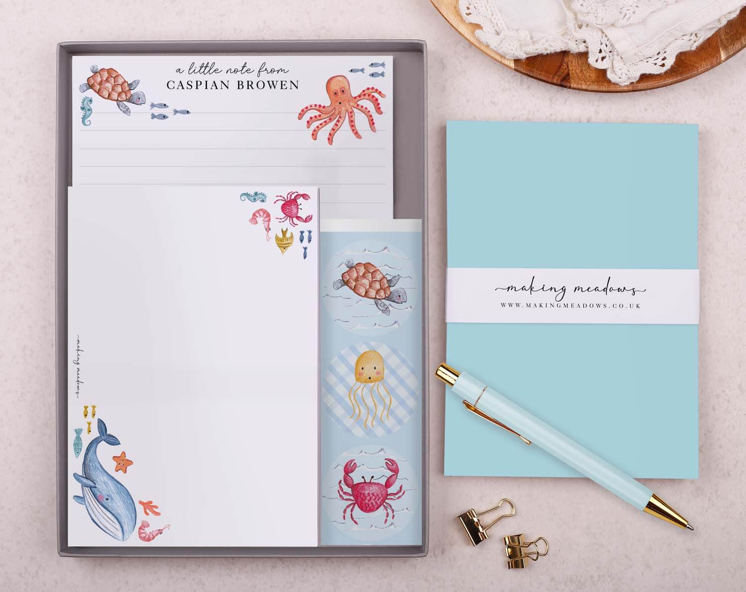 Personalised Children's Stationery Set with Under The Sea design, featuring writing paper, envelopes, and a pen.