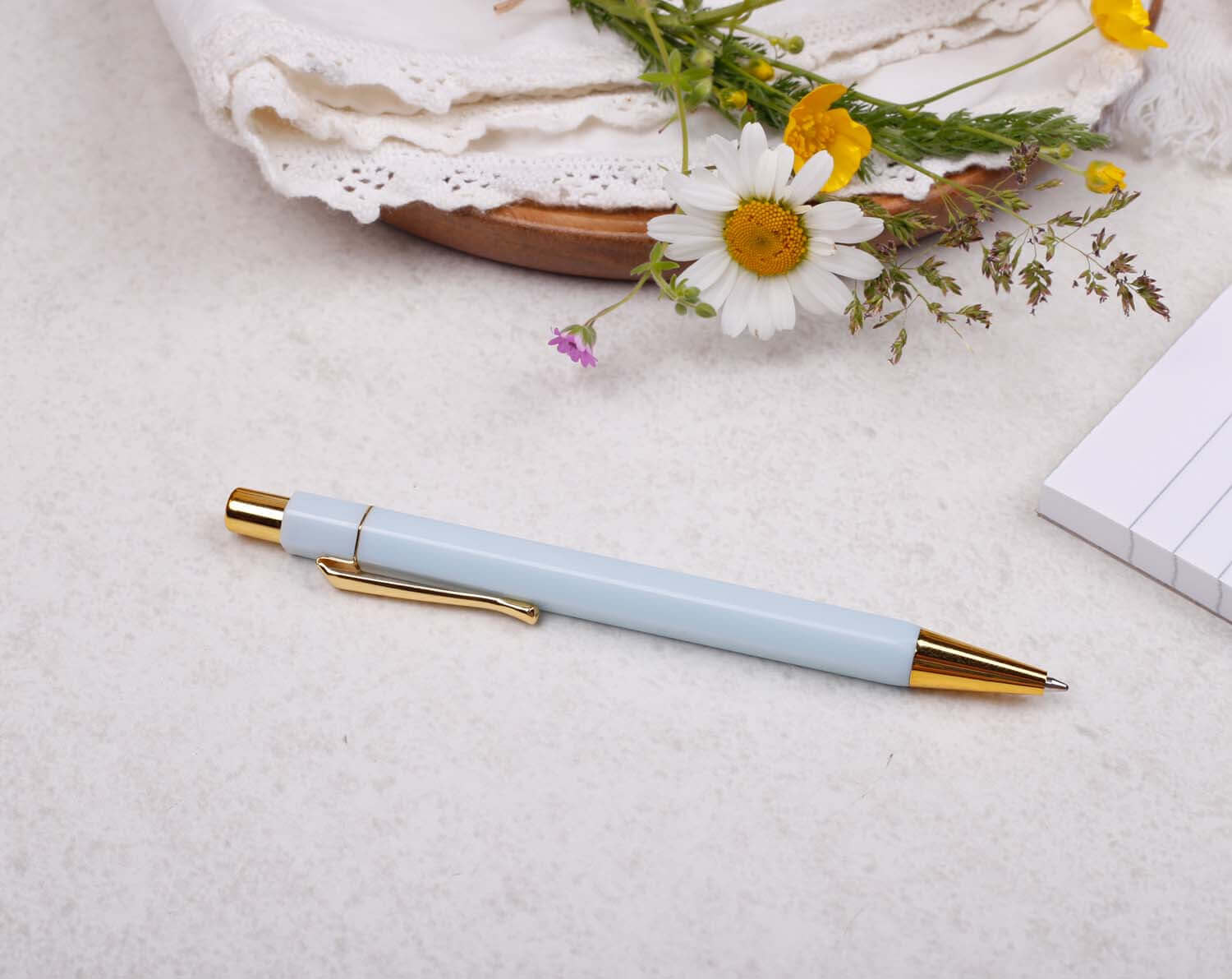premium light blue and gold ballpoint pen with black ink
