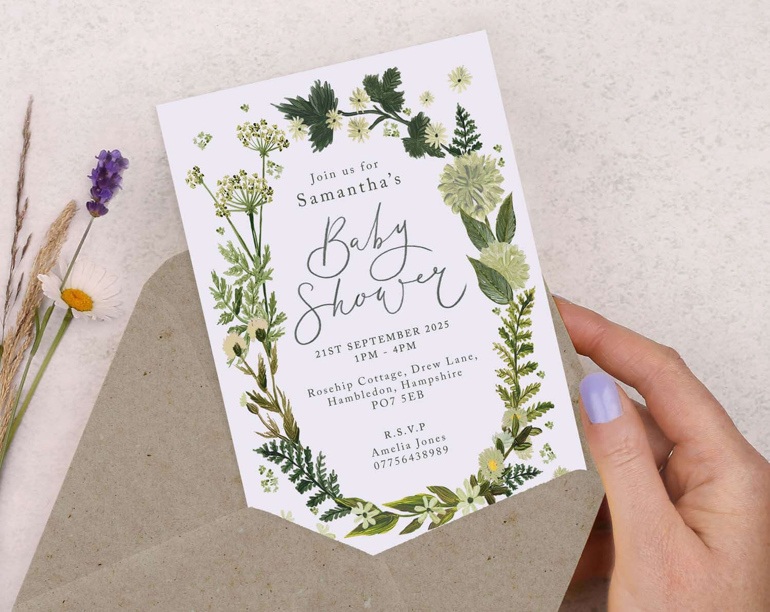 Green Floral Baby Shower Invitation displayed with envelope, featuring a fresh and modern floral design.