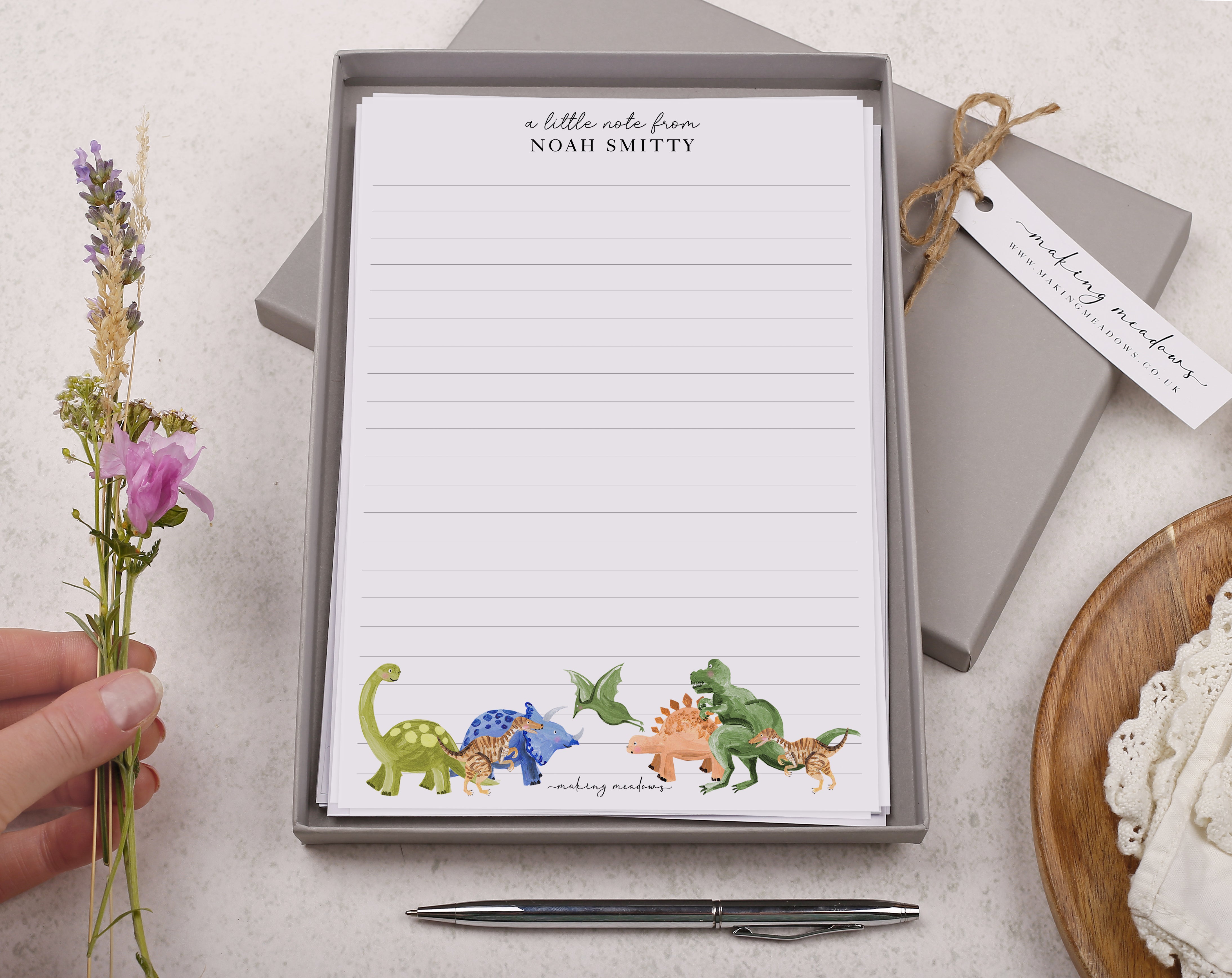 Premium personalised A5 letter writing paper set for children with a cute prehistoric dinosaur design. 