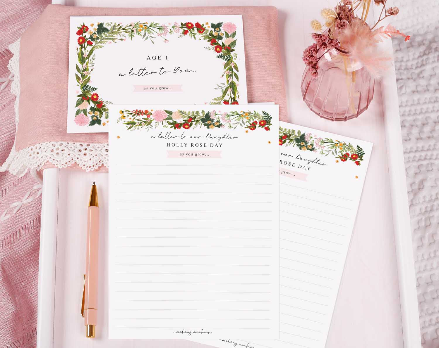 Personalised Wild Floral Letter To Our Daughter set featuring lovely floral designs and writing paper on a pink background.