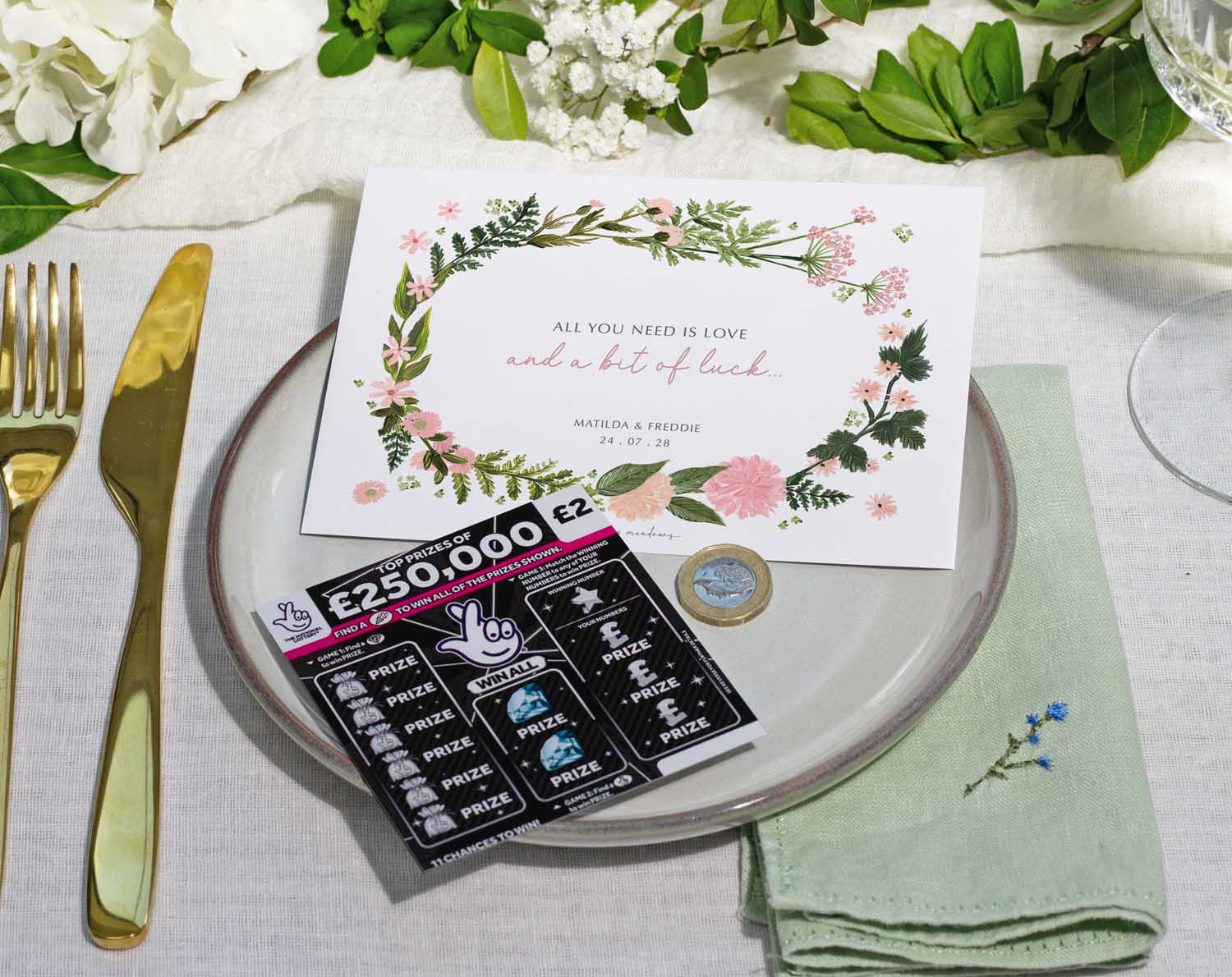 Pink Floral Scratch Card Envelopes displayed on a table with cutlery and floral details, ideal for wedding favours.