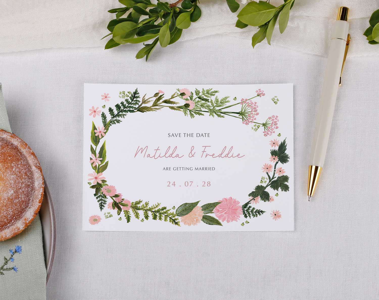 Pink Floral Wedding Save The Date cards with floral design and elegant typography.