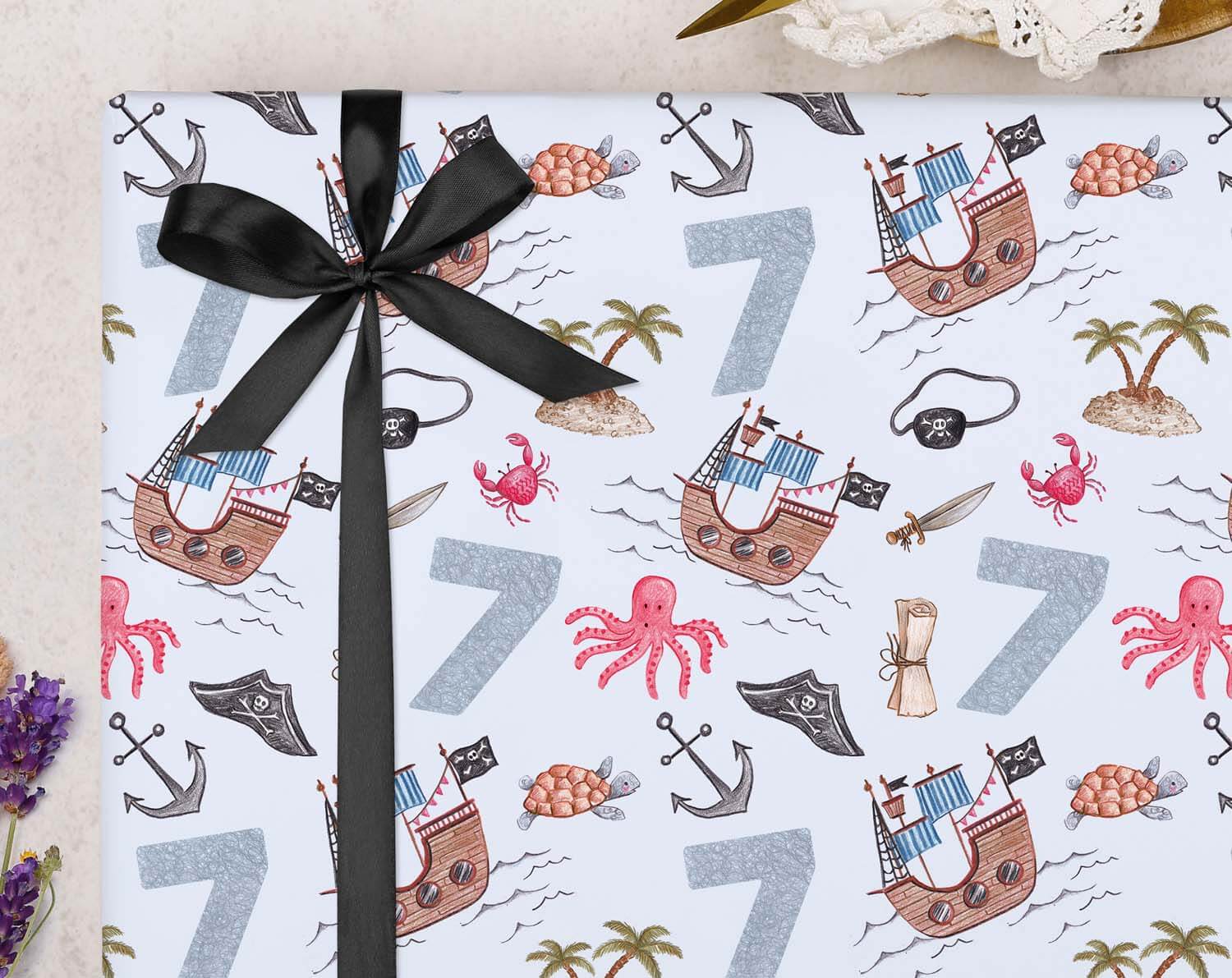 Pirate 7th Birthday Wrapping Paper featuring vibrant pirate ships, numbers, and sea creatures.