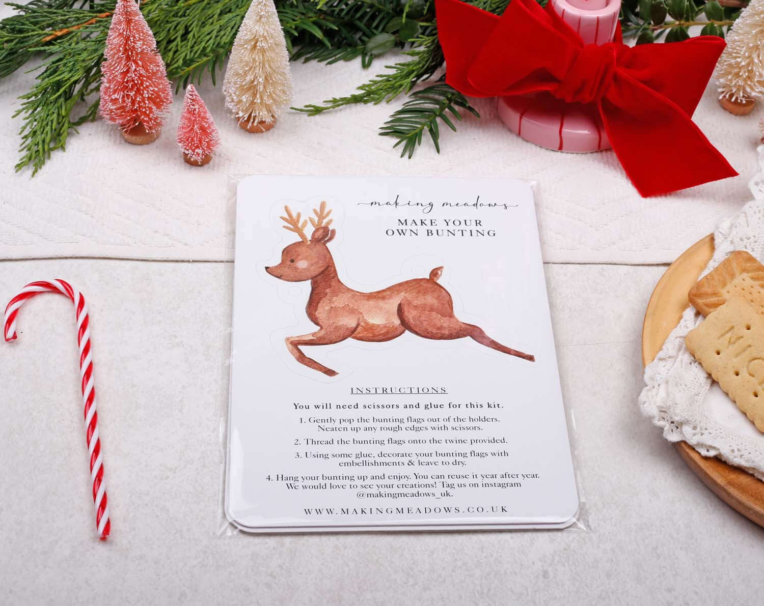 Reindeer Christmas Bunting instructions card featuring a cute reindeer illustration and crafting details.