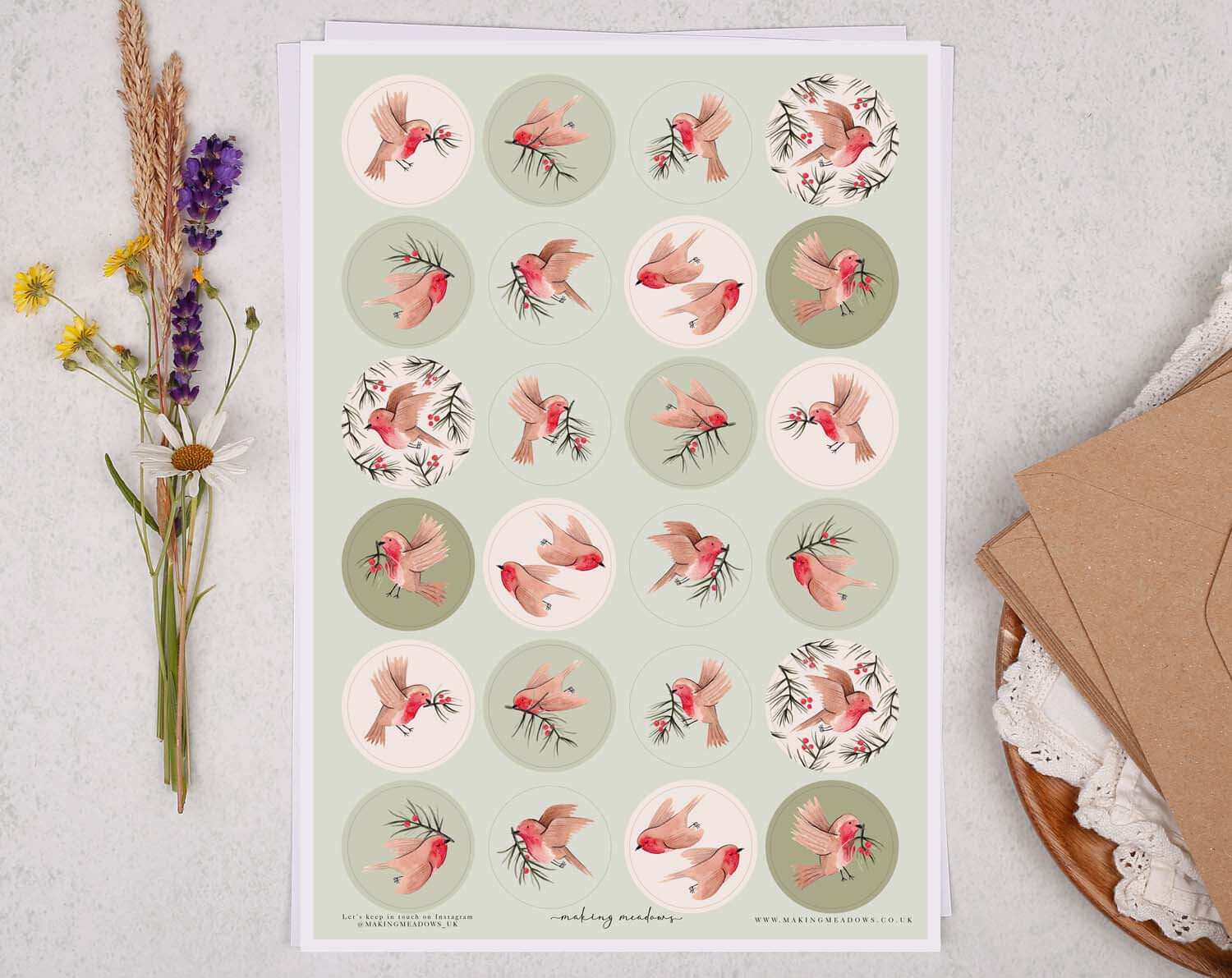 Robin Christmas Stickers featuring charming robins with holly on a decorative sheet.