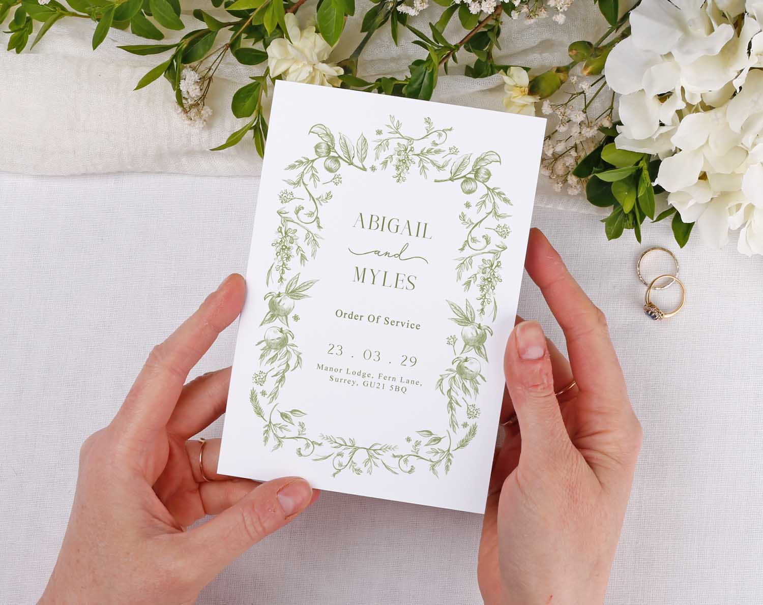 Sage Garden Order Of Service booklet for wedding ceremony with green floral design. 