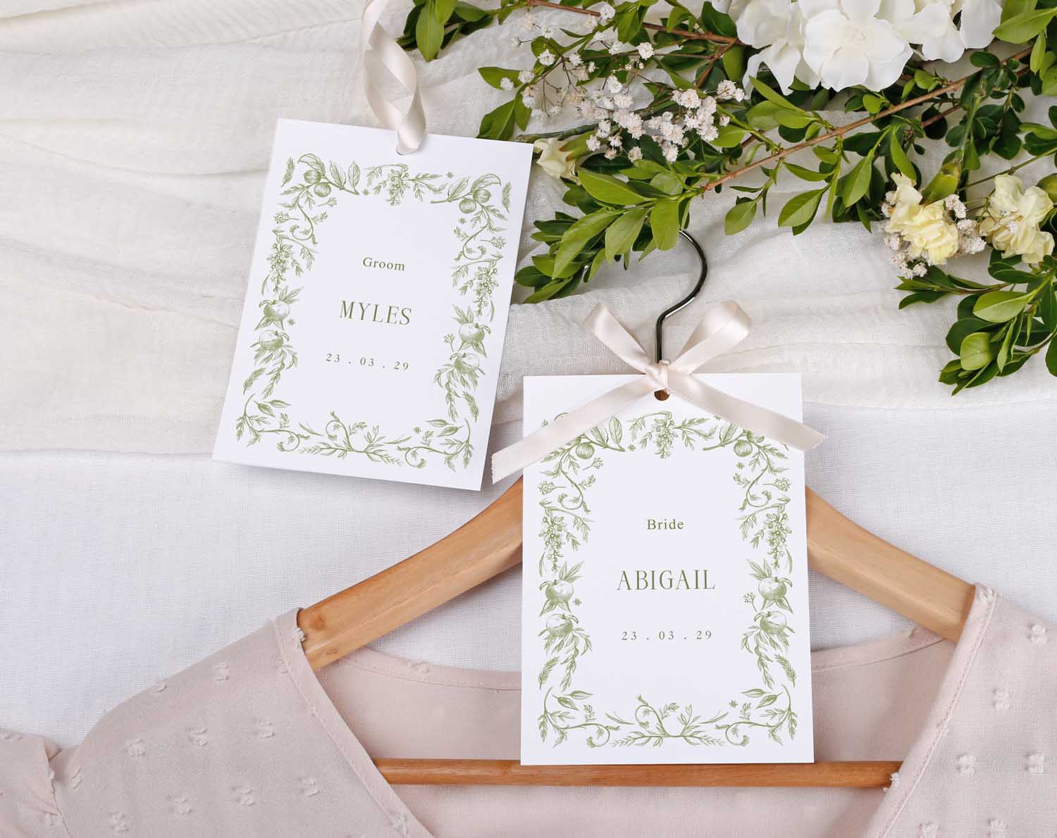 Sage Garden Wedding Hanger Tags for Bride Abigail and Groom Myles with floral design on personalized tags.