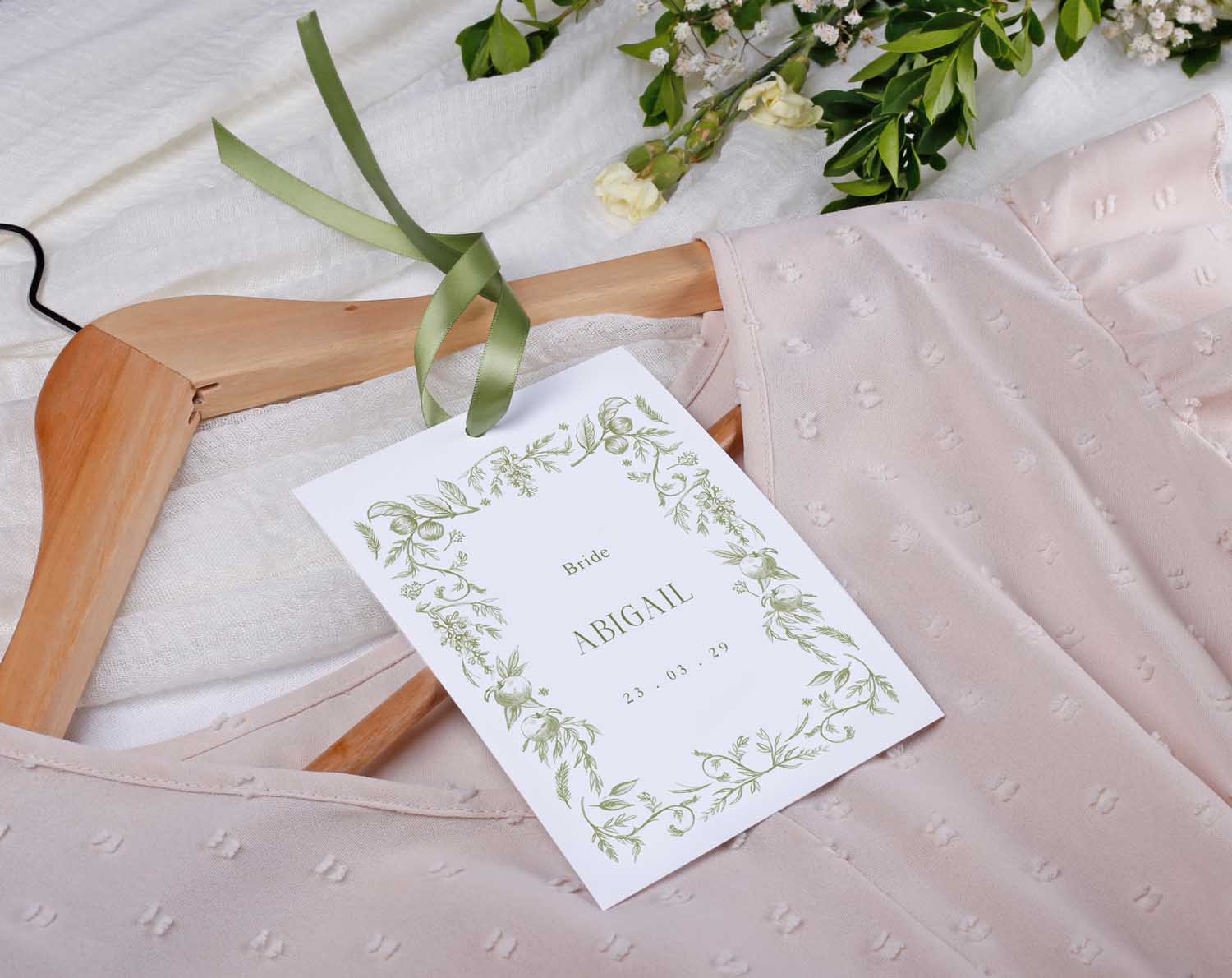 Sage Garden Wedding Hanger Tags for bridal party with a soft green design and personalized name tag.