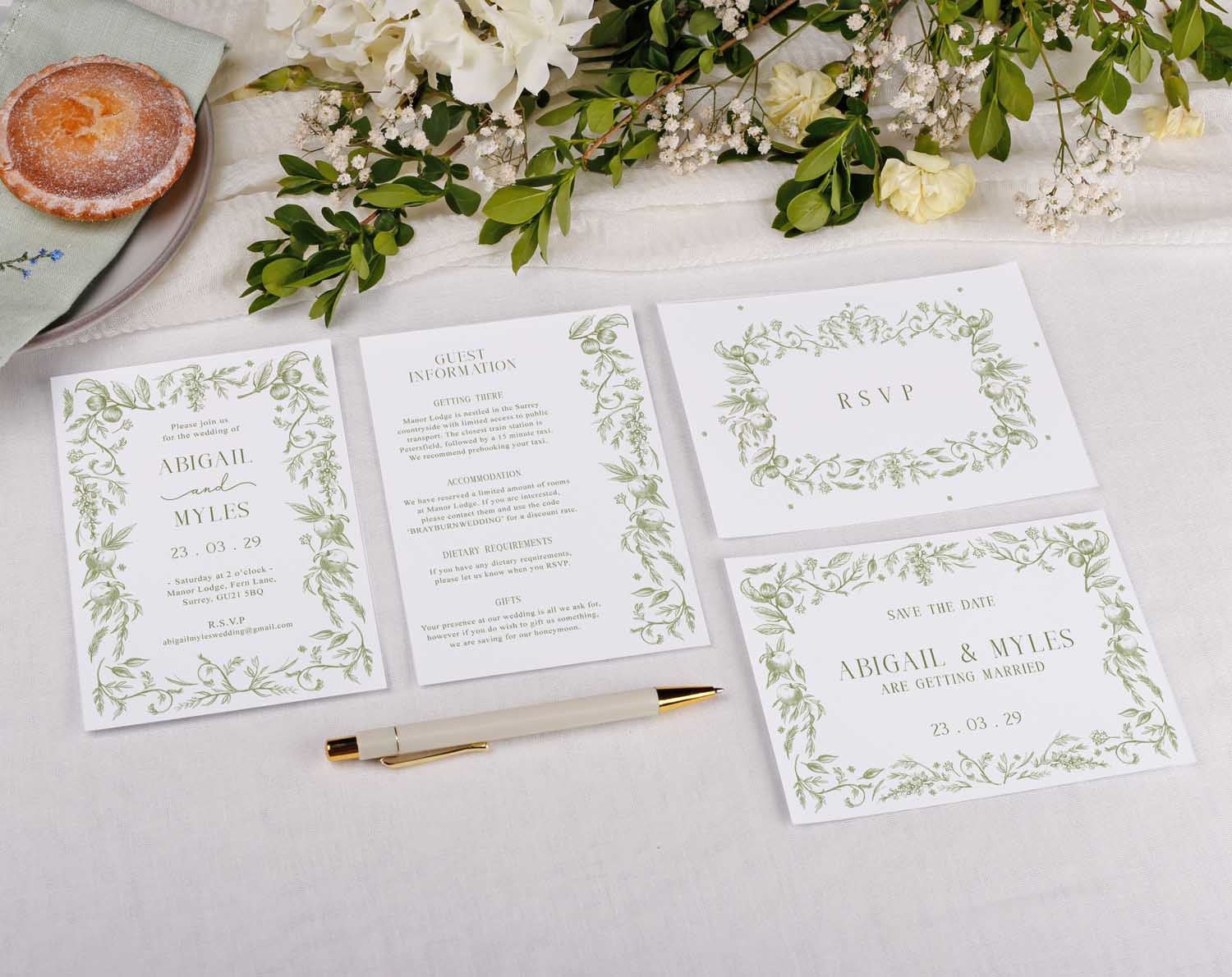 Sage Garden Wedding Invitations featuring elegant floral designs, RSVP, and guest information cards.