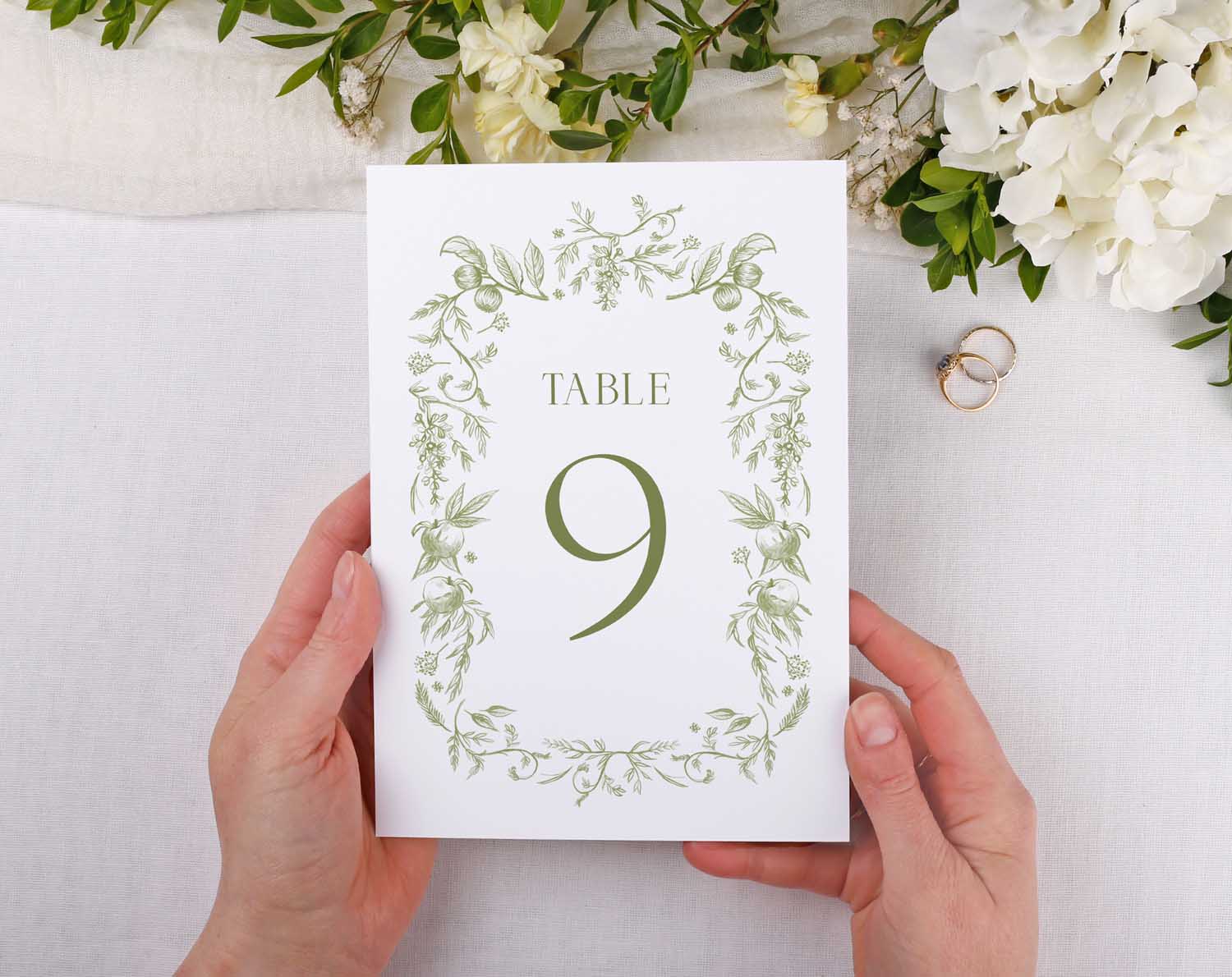 Sage Garden Wedding Table Numbers displaying table 9 with delicate green botanical design.
