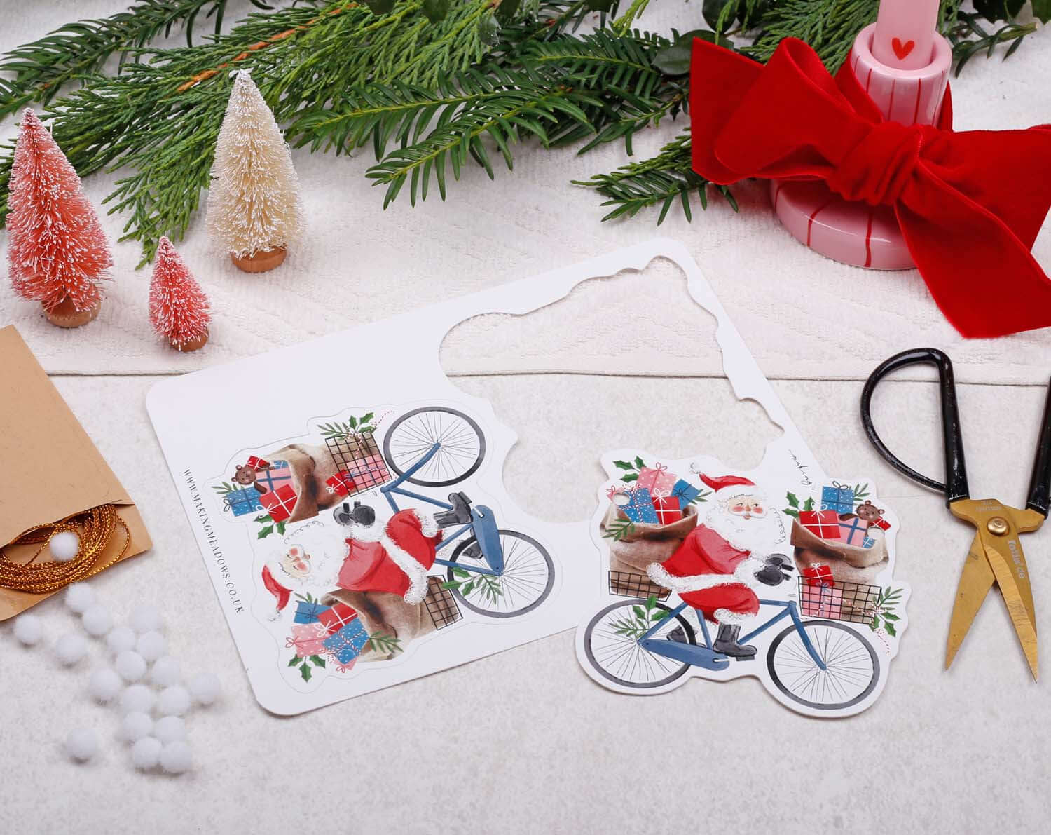 Santa Christmas Bunting featuring Santa on a bicycle surrounded by festive decorations and gifts.