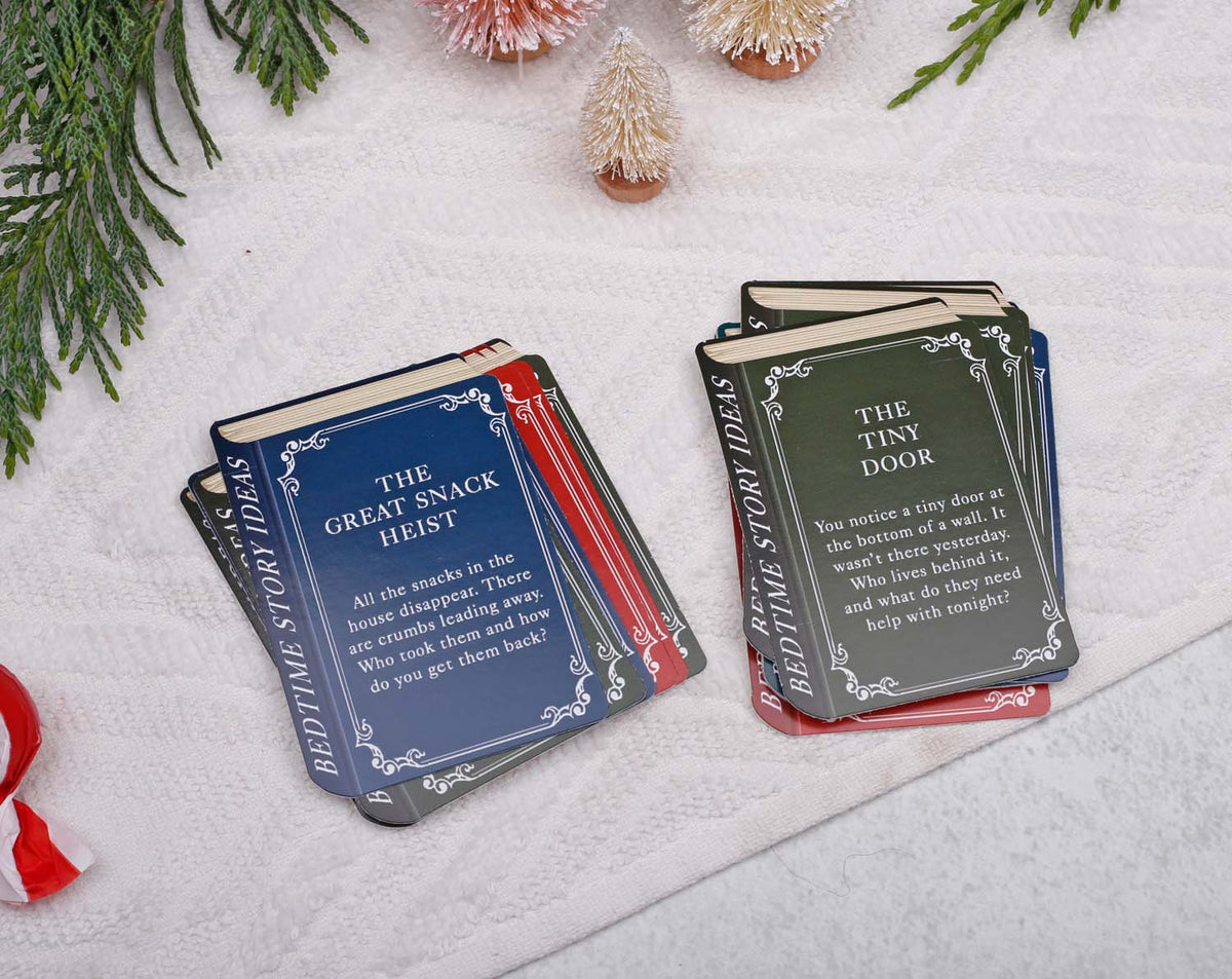 Story Book Idea Advent Calendar featuring bedtime story idea cards on a cozy blanket with holiday decorations.