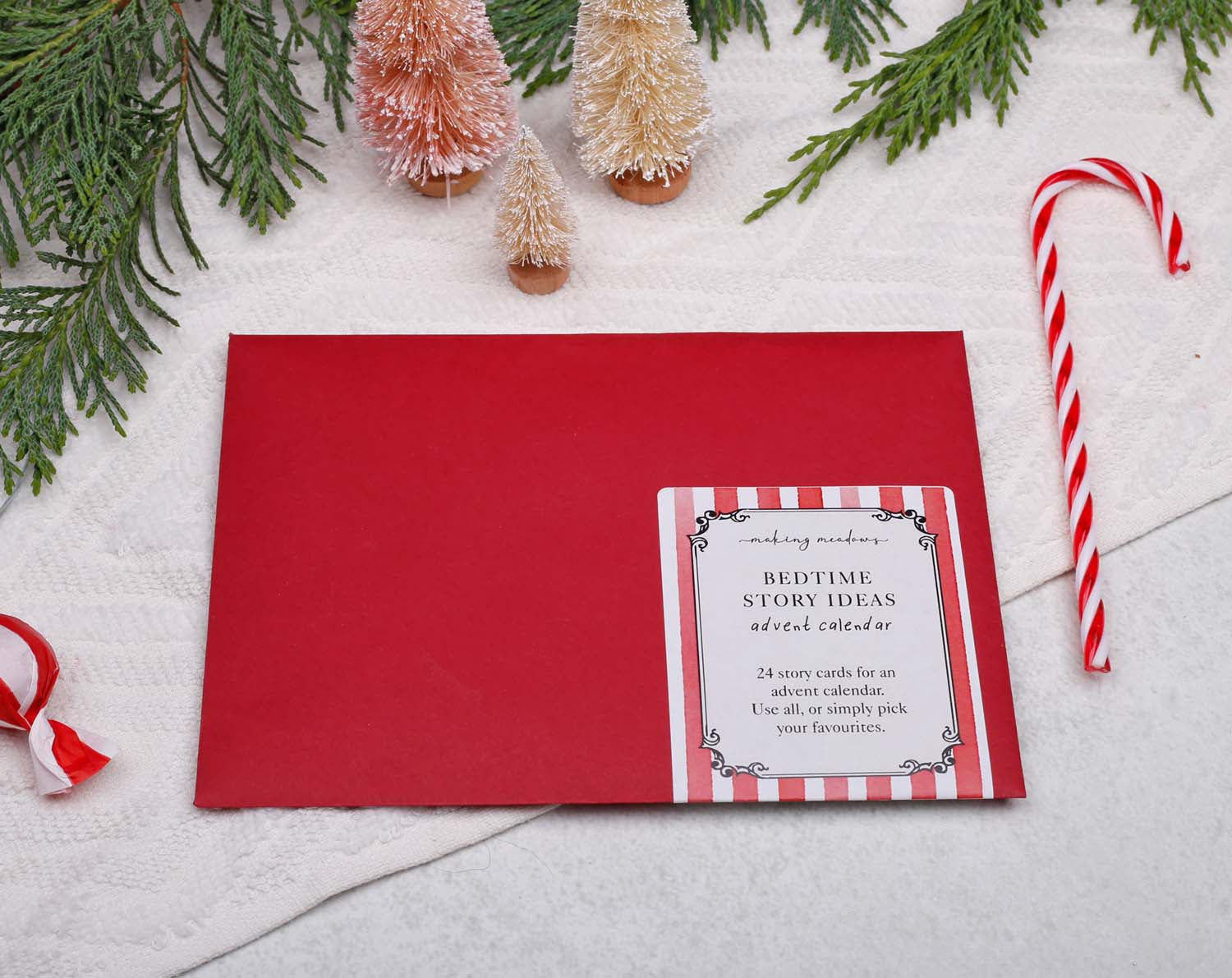 Story Book Idea Advent Calendar with 24 bedtime story idea cards, festive decoration, and candy cane.
