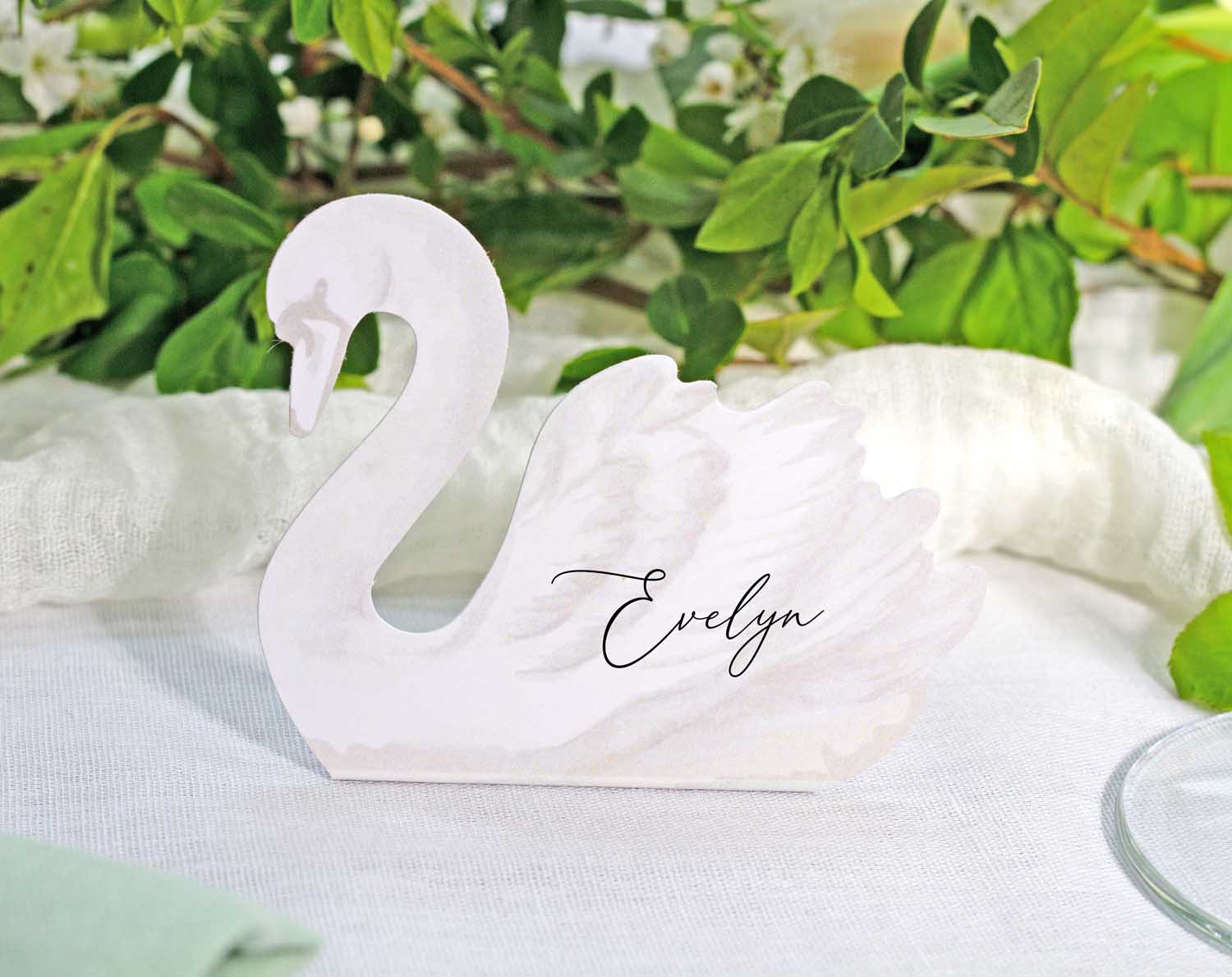 Swan Wedding Place Cards in swan shape with personalized name 'Evelyn' for elegant table settings.