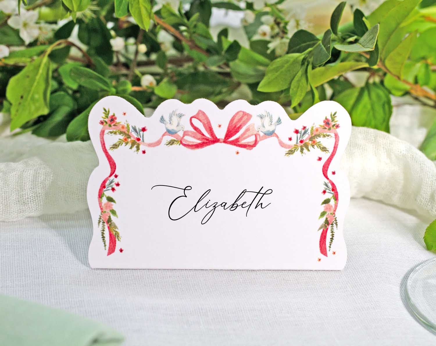 Vintage Wedding Place Cards featuring floral design and elegant script for guest seating.