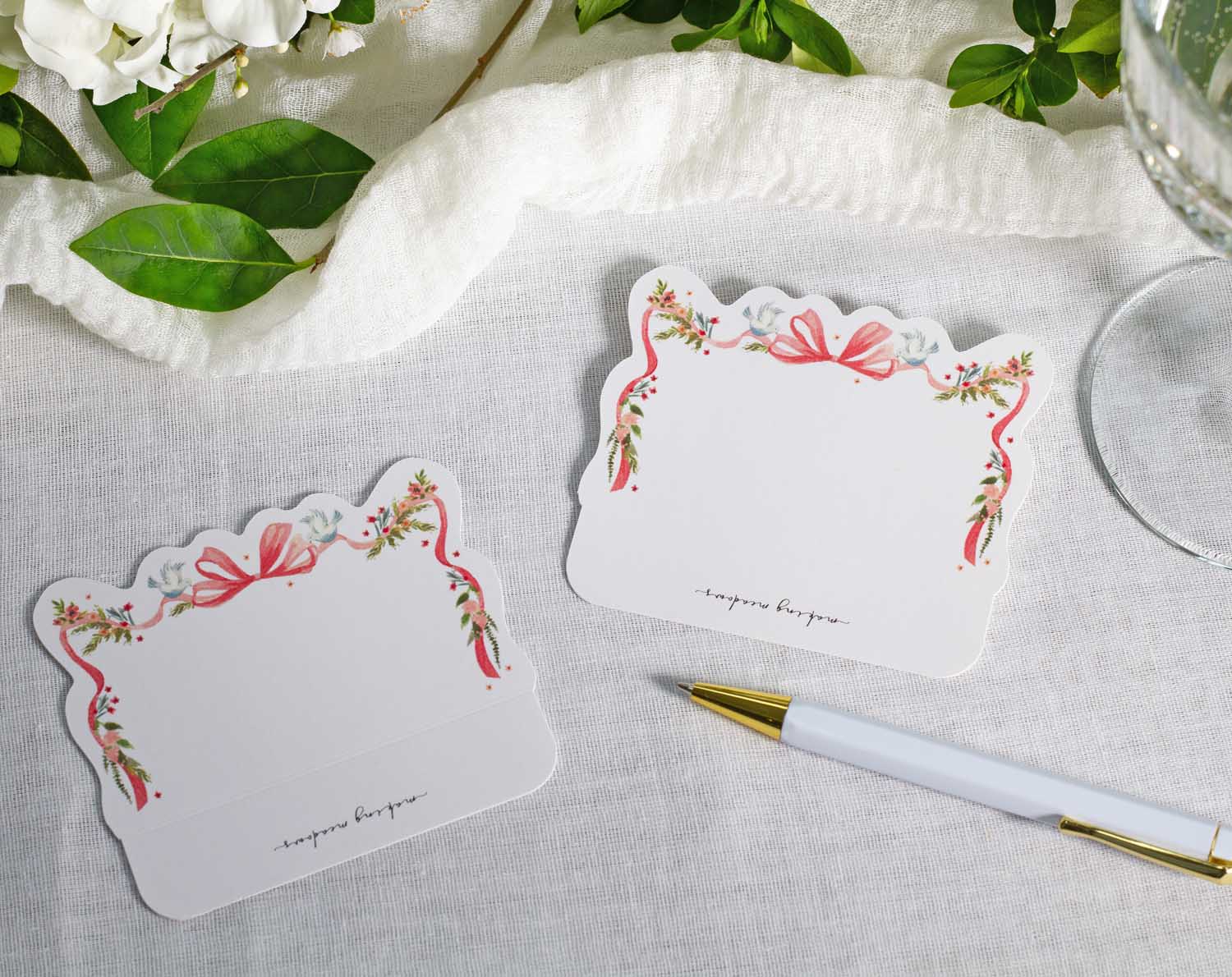Vintage Wedding Place Cards beautifully designed with floral accents for elegant table settings.