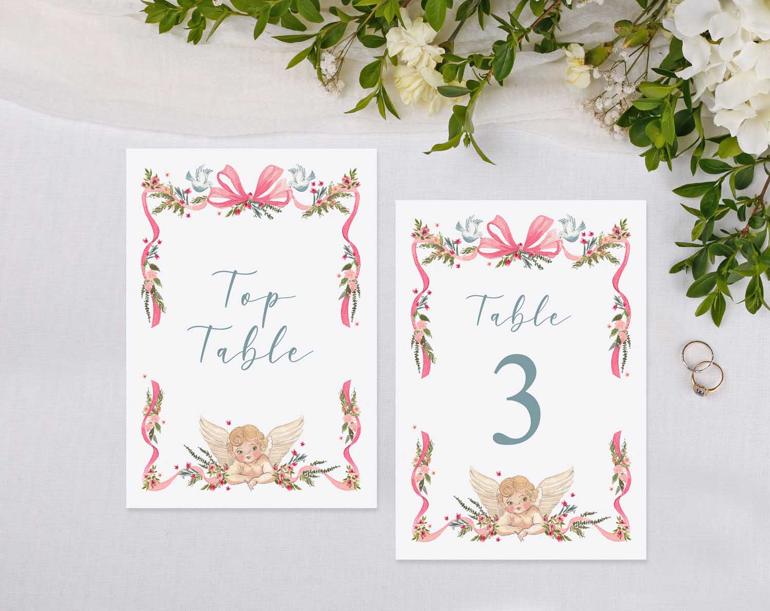 Vintage Wedding Table Numbers featuring floral designs and angel graphics for elegant seating arrangements.