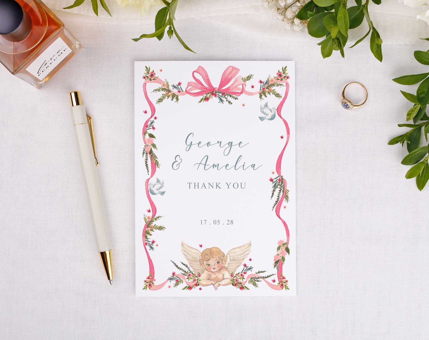 Vintage Wedding Thank You Cards featuring a floral design and a cherub, personalized for George and Amelia.