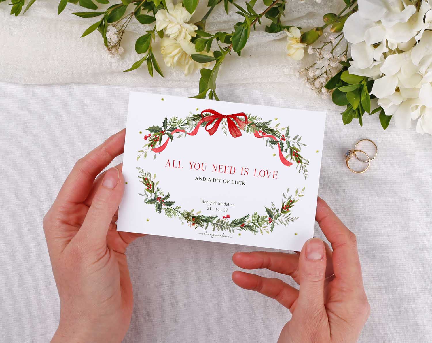 Winter Scratch Card Envelopes for Wedding Favours with floral design and a ribbon, personalized for a couple's special day.