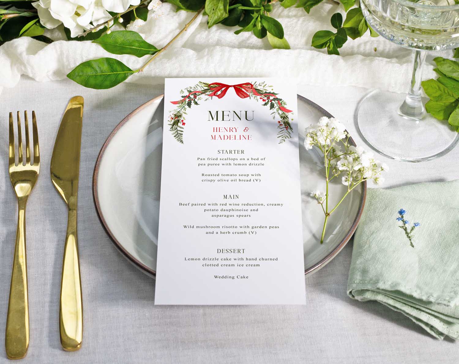 Winter Wedding Menus displayed on a beautifully set table, featuring elegant tableware and floral accents.