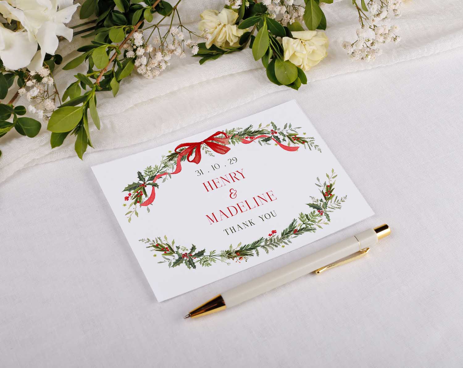 Winter Wedding Thank You Postcards adorned with floral wreath and ribbon, featuring names and date for personalization.