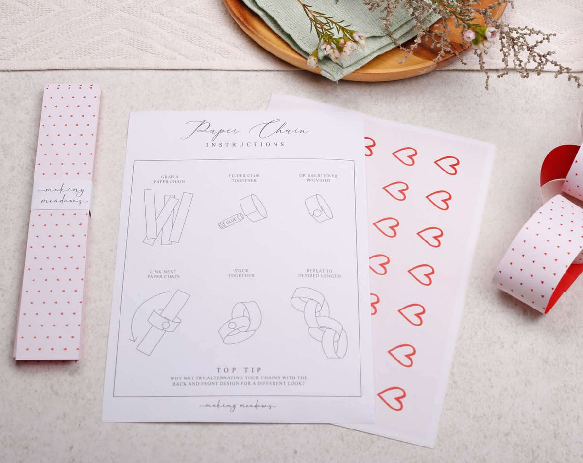 Instructions for making Pink Heart Paper Chains with step-by-step guide and decorative heart patterns.