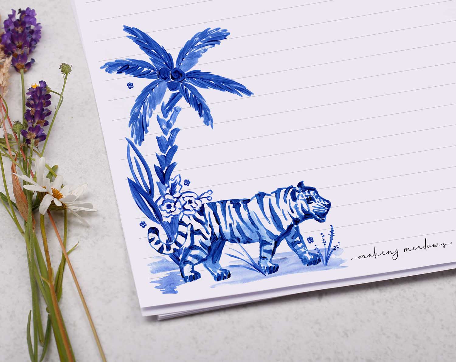A4 writing paper with a blue tiger and palm tree. Stationery designed by Making Meadows