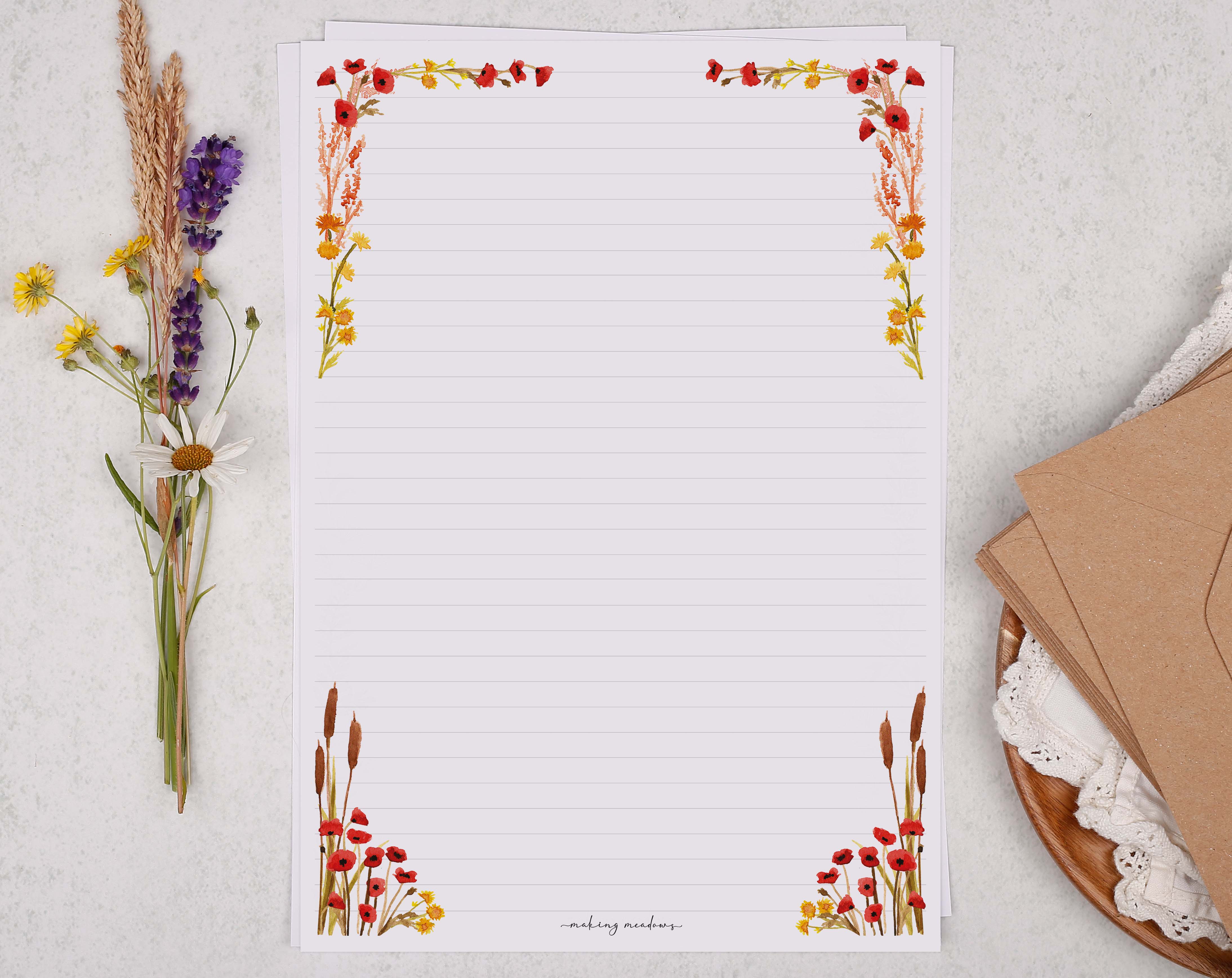 A4 writing paper with a poppy & river reed border. Stationery designed by Making Meadows