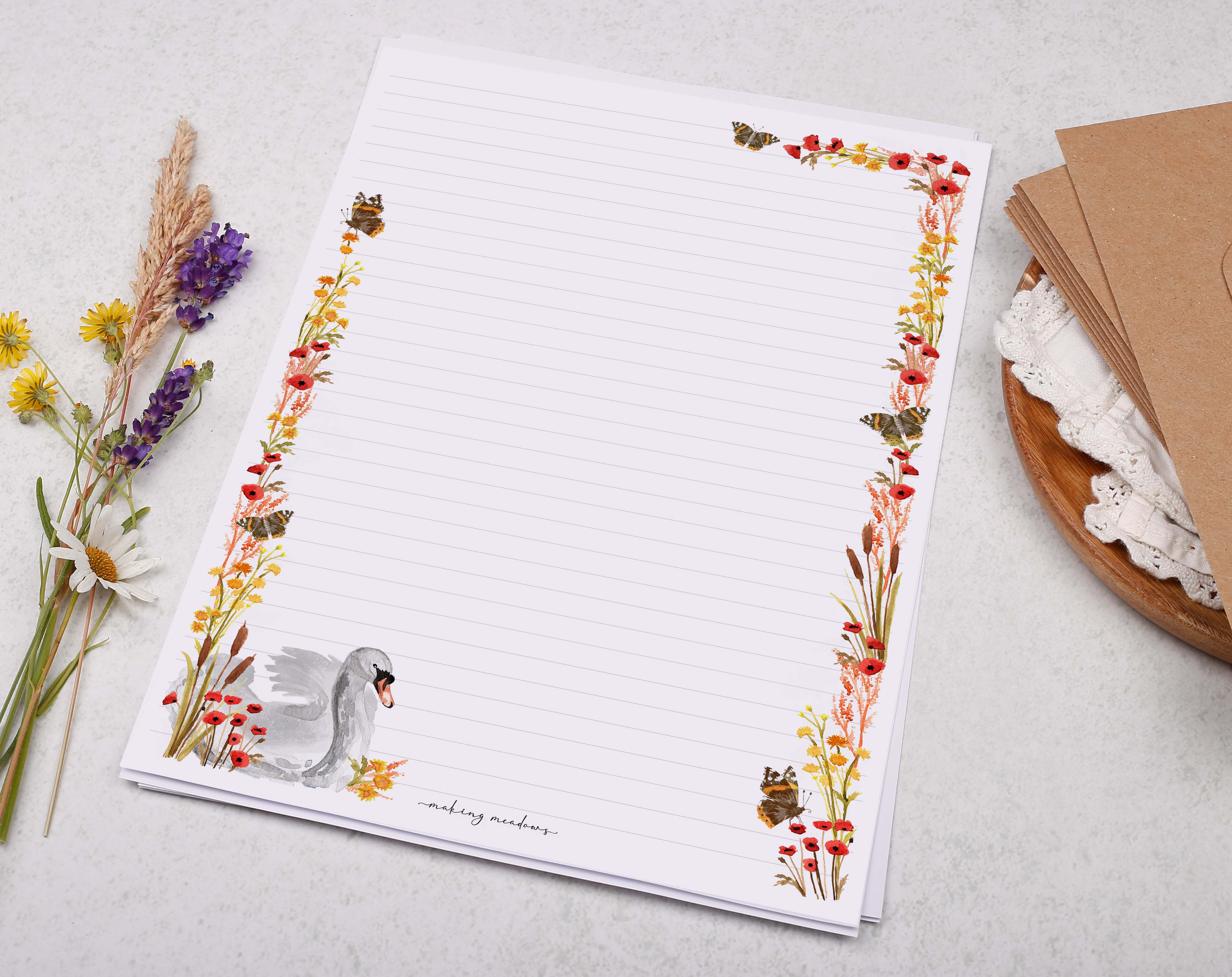 A4 writing paper with a swan and flower border. Stationery designed by Making Meadows