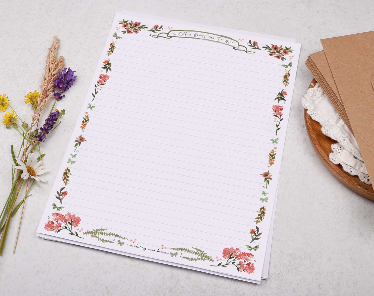 A4 writing paper with pink floral border. Stationery designed by Making Meadows
