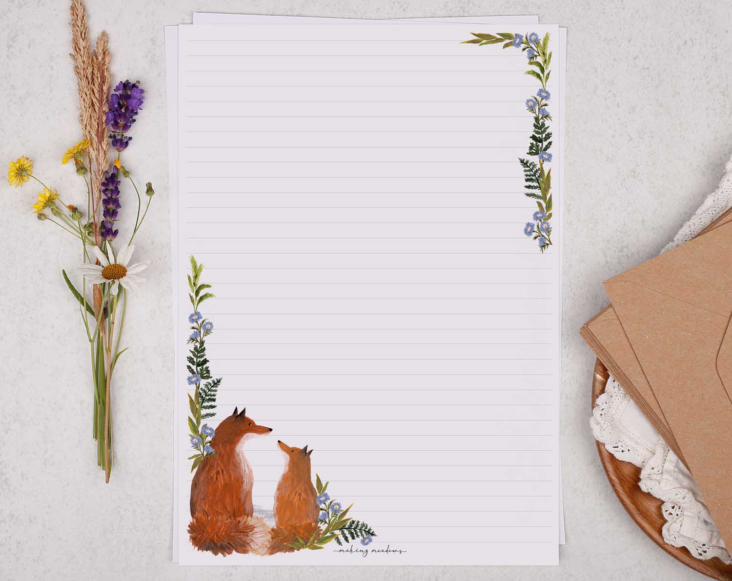 A4 writing paper with red fox and blue floral border. Stationery designed by Making Meadows