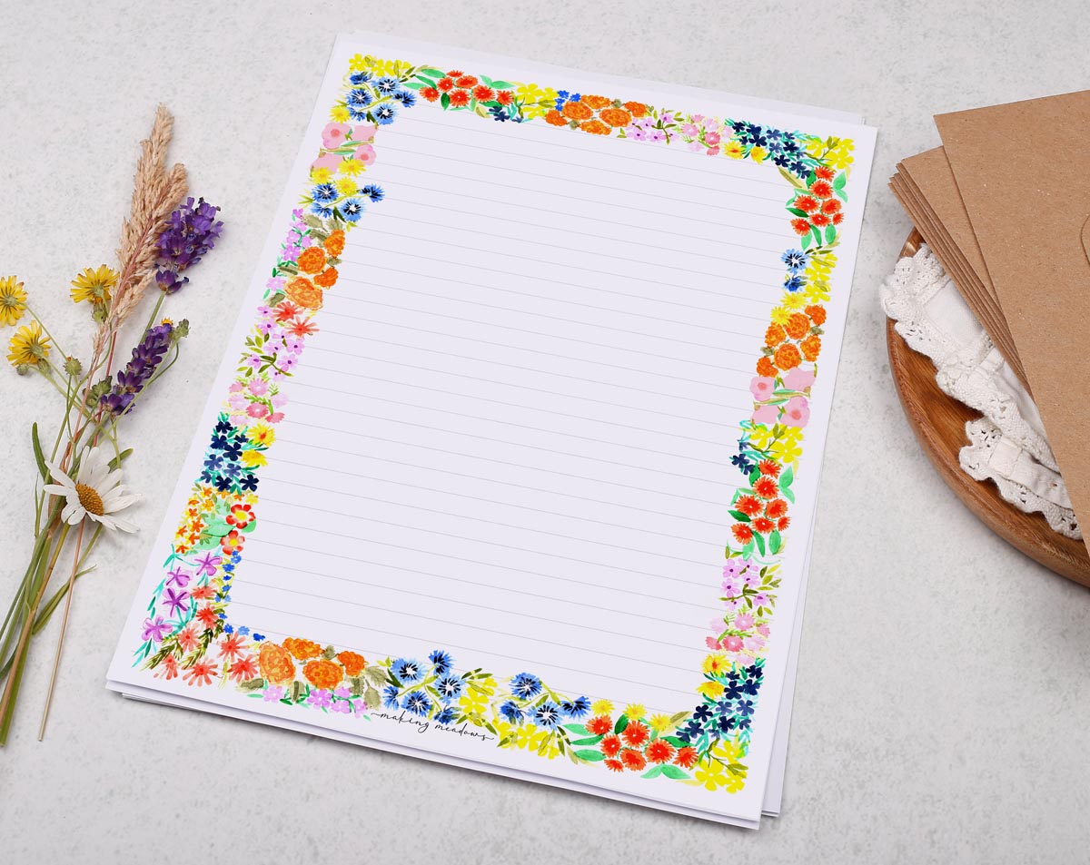 A4 letter writing paper sheets with a bold floral watercolour border design cascading around the edge. 