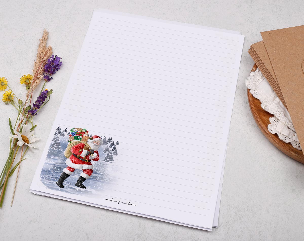 A4 Christmas letter writing paper sheets with a jolly Santa design.