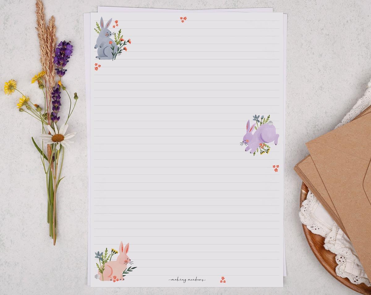 Pretty A4 letter writing paper sheets with adorable pastel bunny rabbits bouncing across the page.