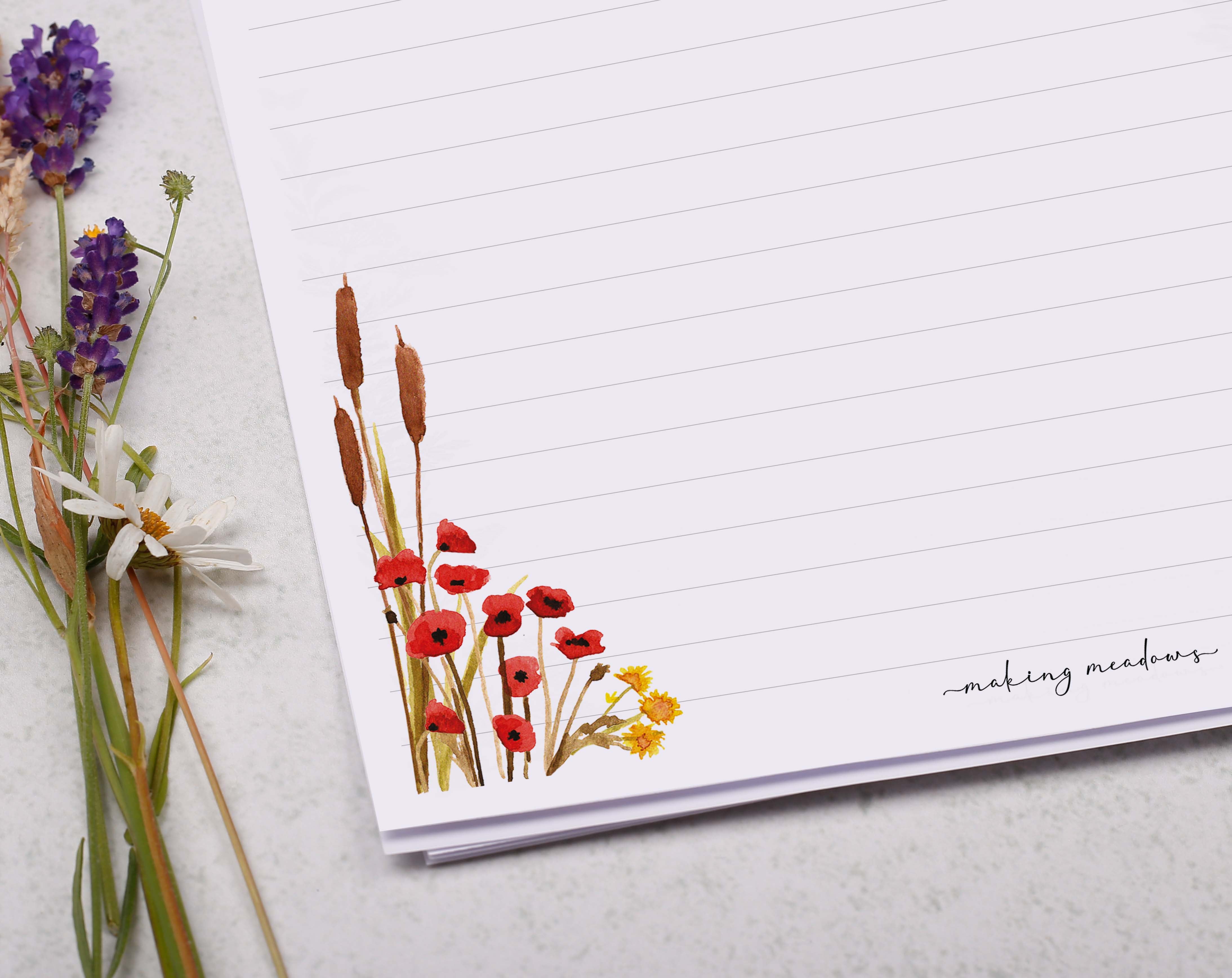 A4 writing paper with a poppy & river reed border