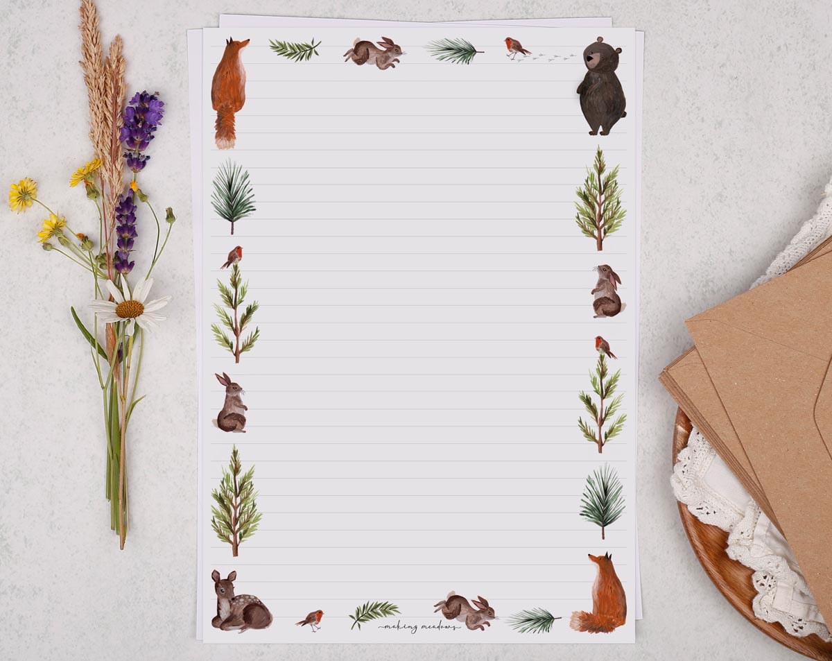 Whimsical A4 letter writing paper sheets with a woodland animal border. Decorated with deer, foxes, rabbits and bears