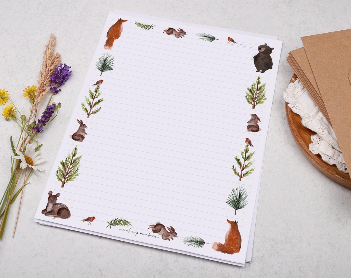 Whimsical A4 letter writing paper sheets with a woodland animal border. Decorated with deer, foxes, rabbits and bears