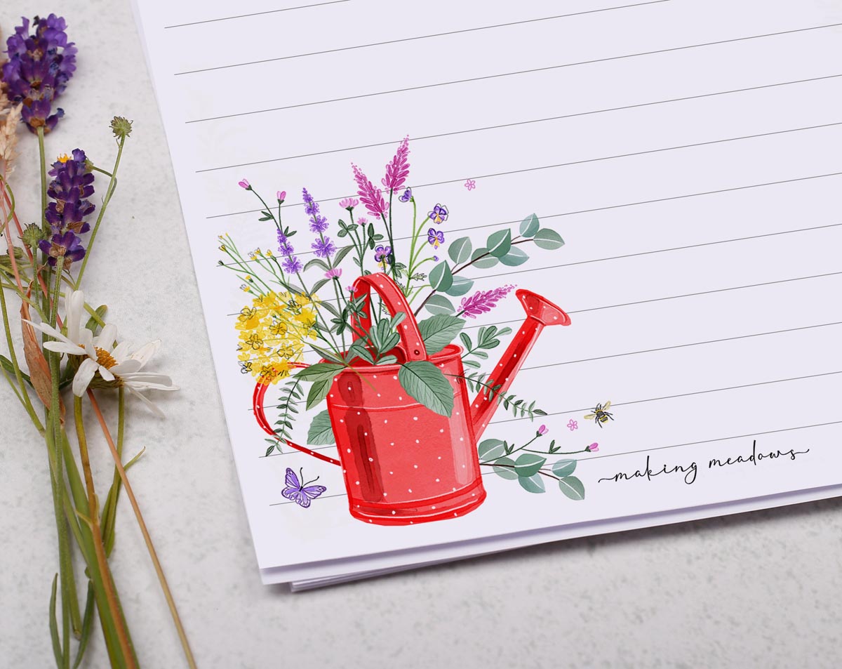 Traditional A5 letter writing paper sheets with a watercolour painted red watering can, bursting with flowers.