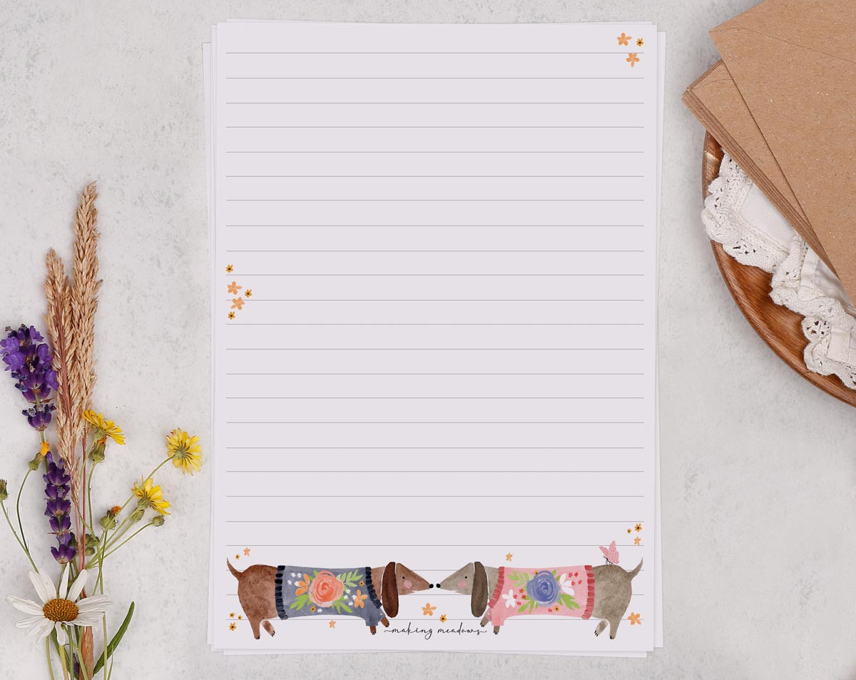 Cute A5 letter writing paper sheets with a sausage dog illustration.