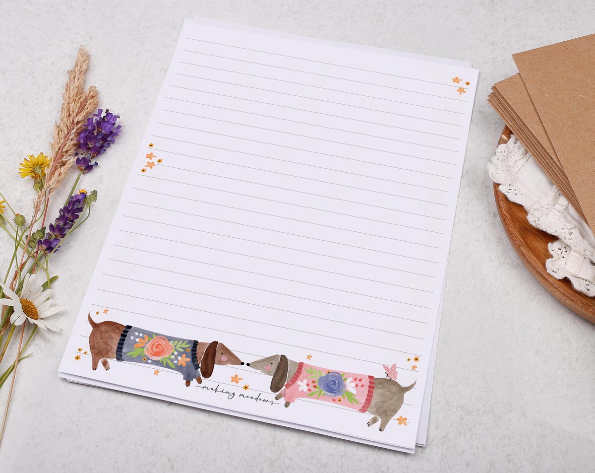 Cute A5 letter writing paper sheets with a sausage dog illustration.
