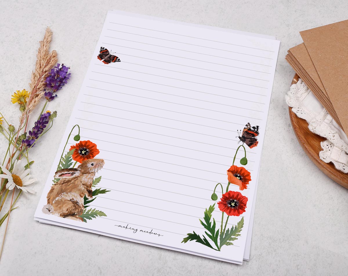 Traditional A5 letter writing paper sheets with a rabbit and poppy flower border.